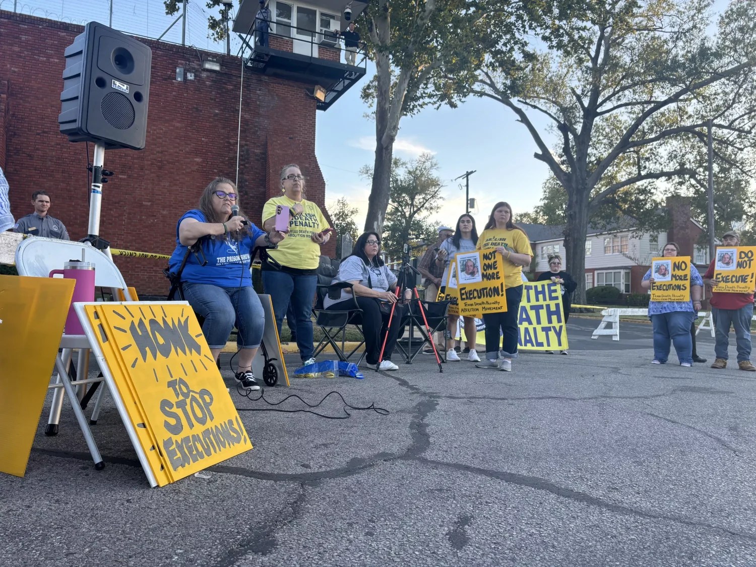 A group of death penalty protesters wait to hear the latest news in Robert Roberson’s case on Oct. 17, 2024.