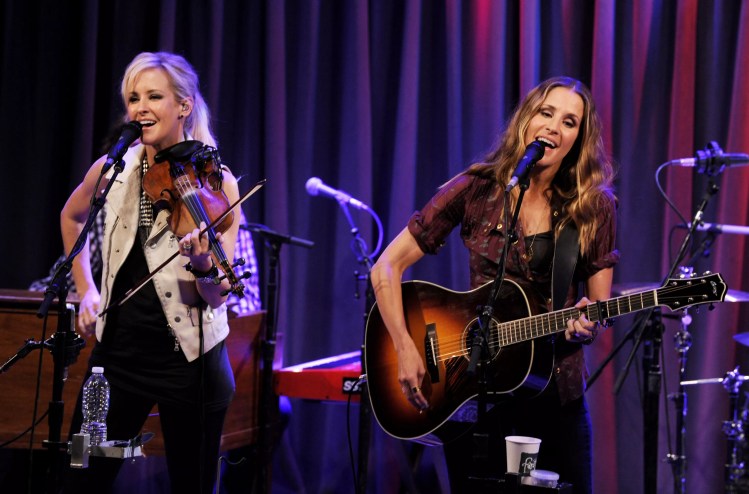 Chicks Martie Maguire (left) and Emily Robison perform as the Court Yard Hounds